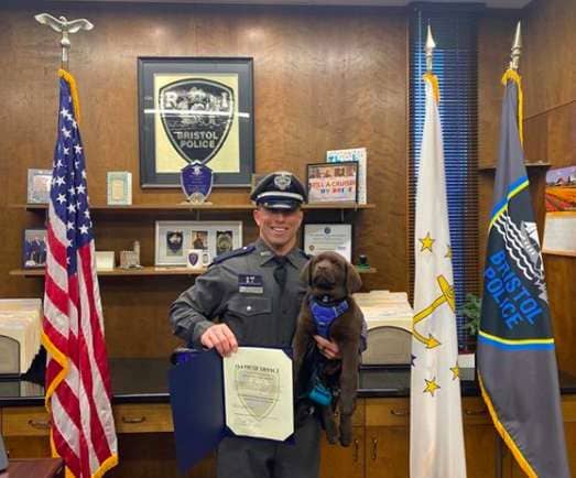 Police Therapy Puppy Takes a Nap During His Swearing-In Ceremony